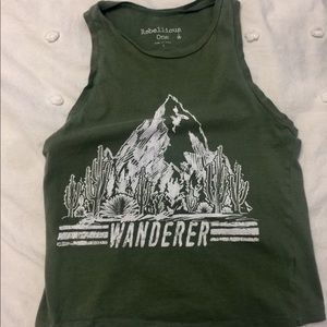 A tank top that is green says wanderer